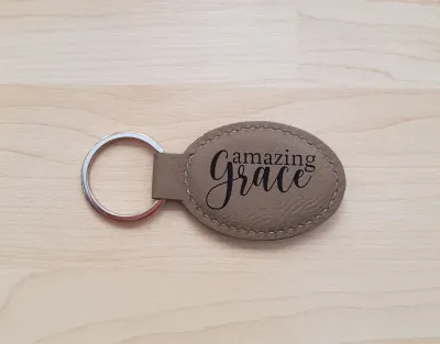 Schlüsselanhänger, "Amazing Grace" - beige, Kunstleder, mit graviertem Schriftzug
